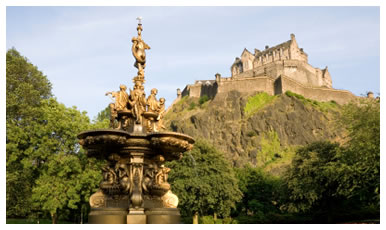 Photograph of the Ross Fountain in Princes Steet Gardens, Edinburgh with Edinburgh Castle forming the background skyline